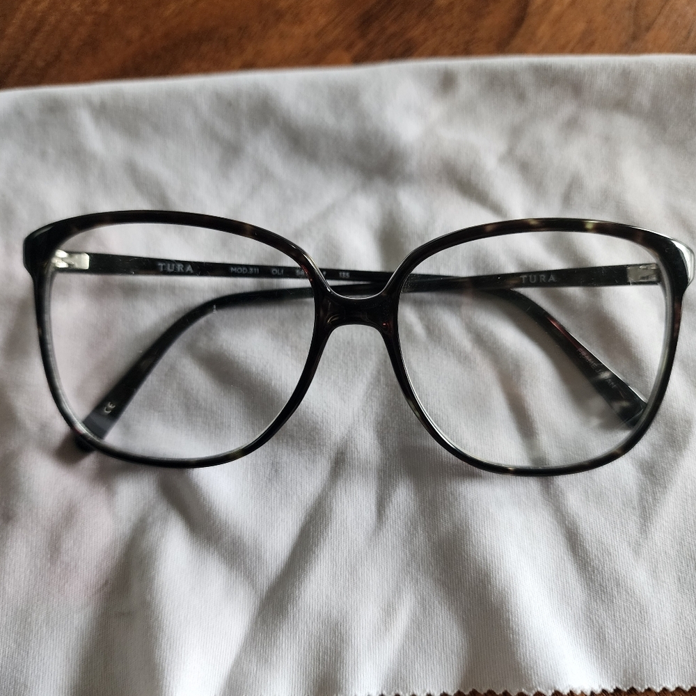 Green and black translucent tura 311 eyeglasses